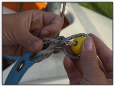 Photo 18, Fixing a rope stopper to a sail